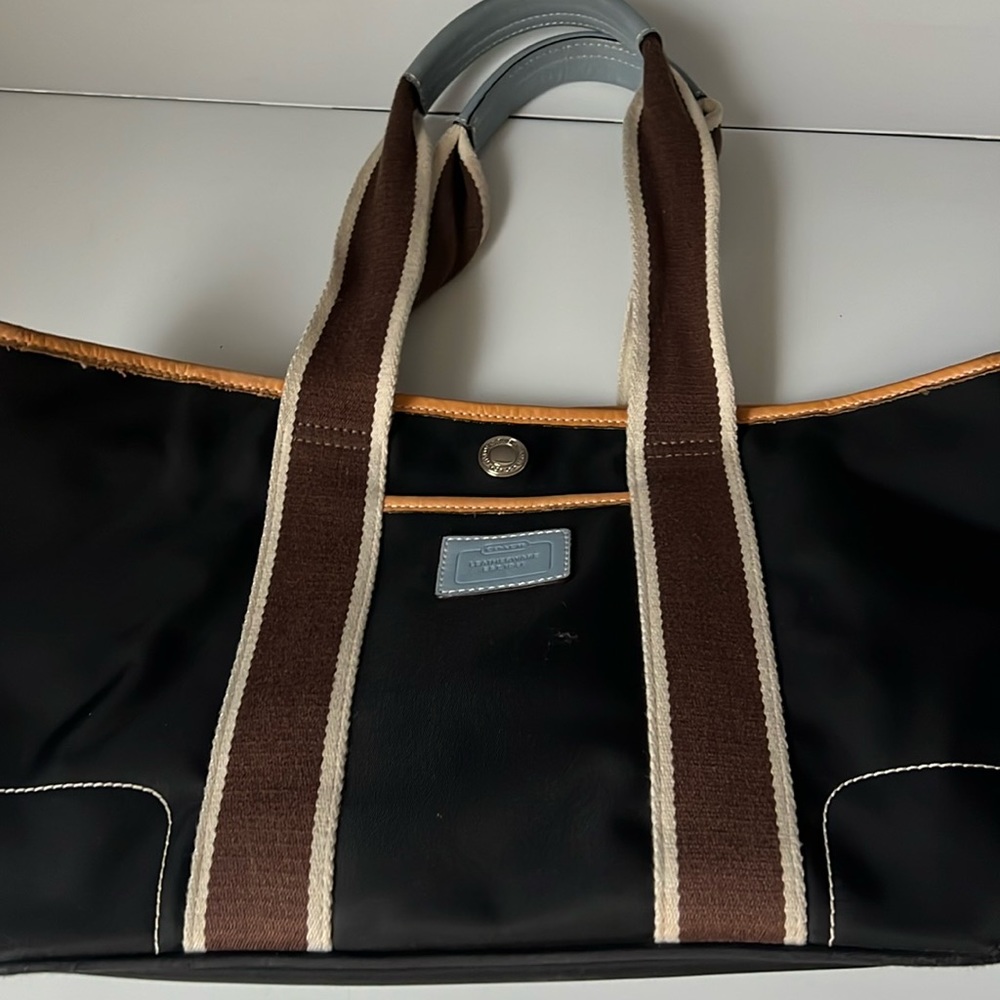 Coach purse. Zip top. Blue detail. Gently used